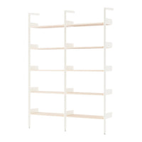 Sleek white shelving unit with light wood shelves, featuring a minimalist design and neutral color palette.