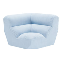 Light blue, plush corner sofa with a smooth fabric and modern geometric design, perfect for contemporary interiors.