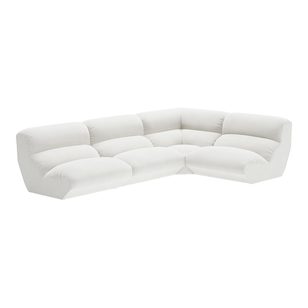 White modern sectional sofa with soft, textured upholstery and plush cushions in a minimalist design.