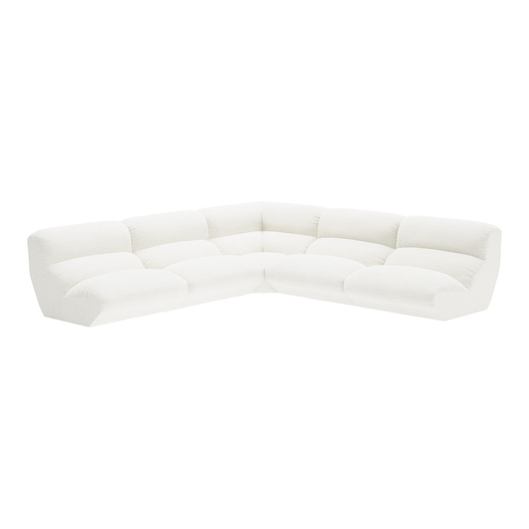 Modern white sectional sofa with plush, quilted upholstery and a sleek design for a contemporary living room.