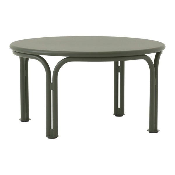 Round green metal coffee table with smooth surface and curved legs, ideal for modern decor.