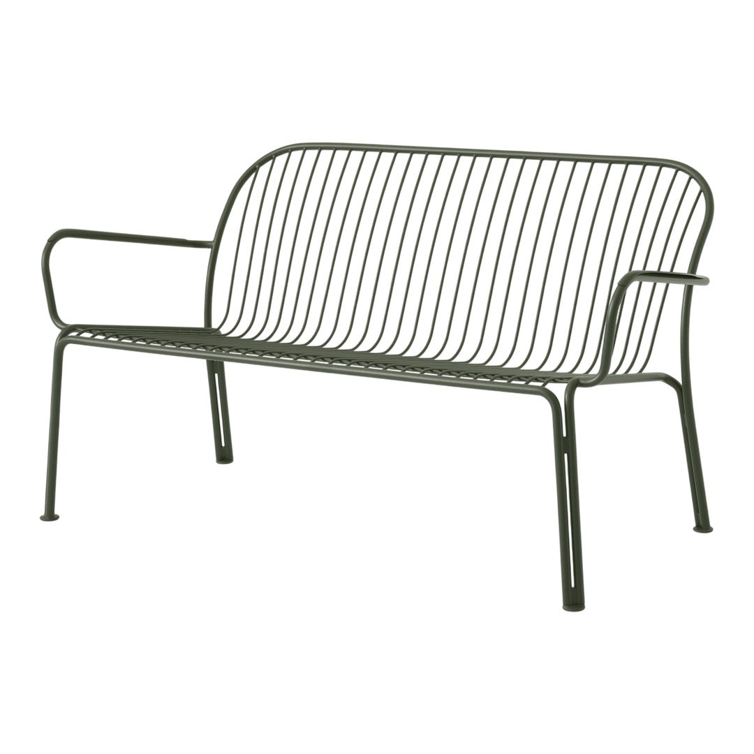Green metal bench with sleek, modern lines and a minimalist design, featuring a series of horizontal and vertical bars.