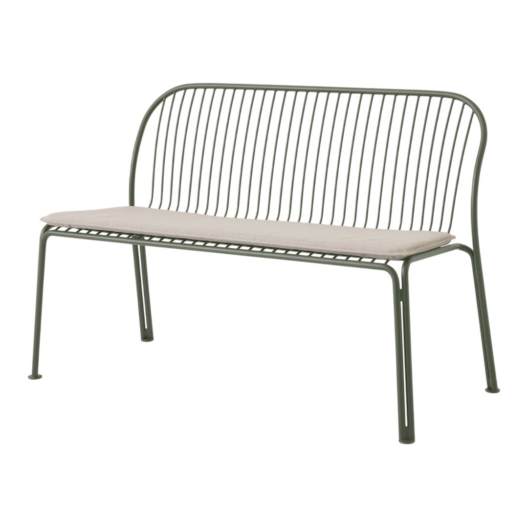 Green metal bench with a sleek, modern design and a light beige cushion for added comfort.