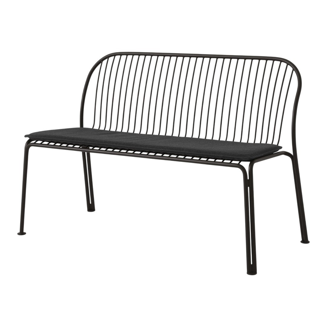 "Elegant black metal bench with sleek lines and a minimalist design, perfect for modern outdoor spaces."
