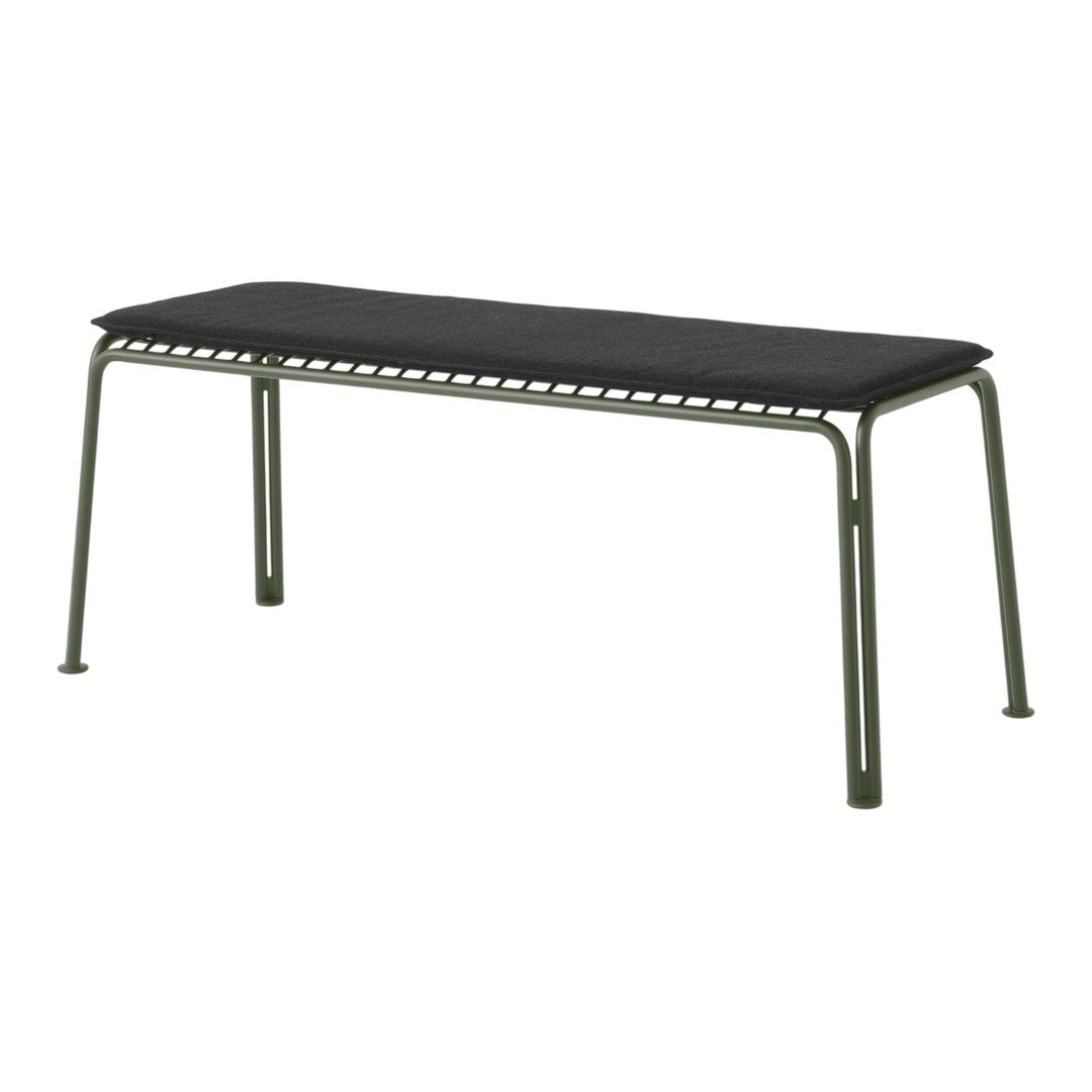 Black padded bench with green metal frame and simple linear design, perfect for modern interiors.