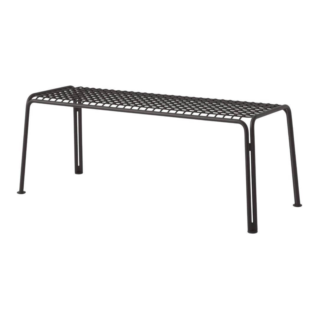 Black metal bench with a slatted pattern, perfect for outdoor or indoor use. Sleek, modern design complements any decor.