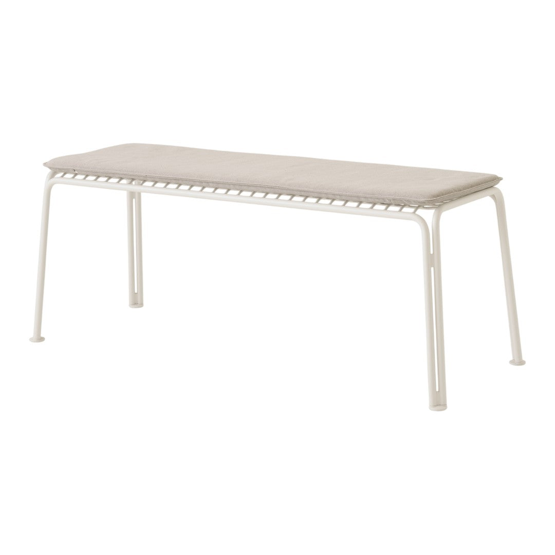 Modern white bench with a neutral beige cushion and a clean, minimalist design. Ideal for versatile decor.