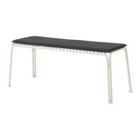 Black cushioned bench with a sleek white metal frame and minimalist design, ideal for modern interiors.