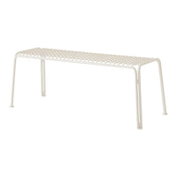 White metal bench with a perforated pattern, minimalistic design ideal for modern spaces.