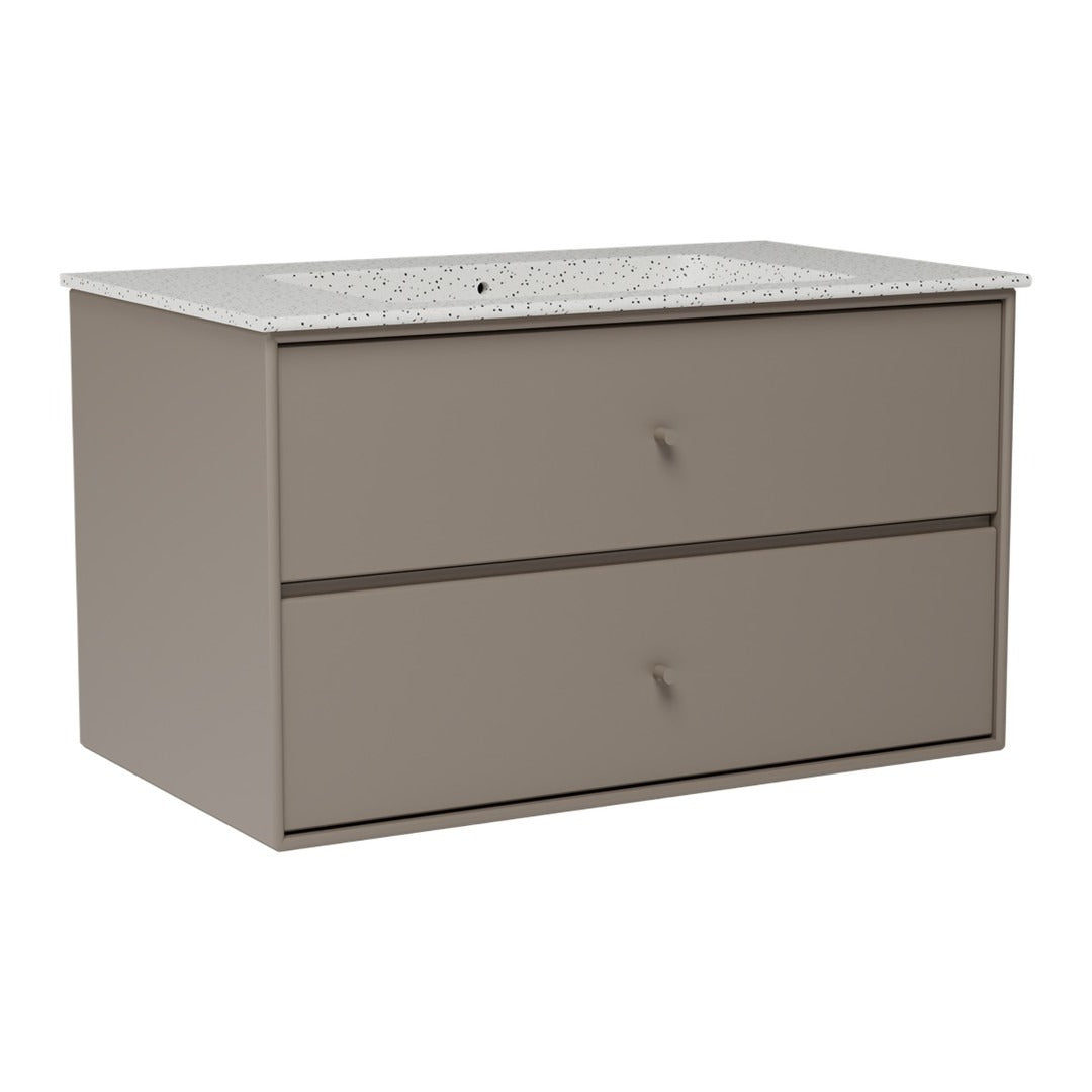 Stylish grey storage cabinet with a textured white countertop and simple drawer handles. Modern and functional design.