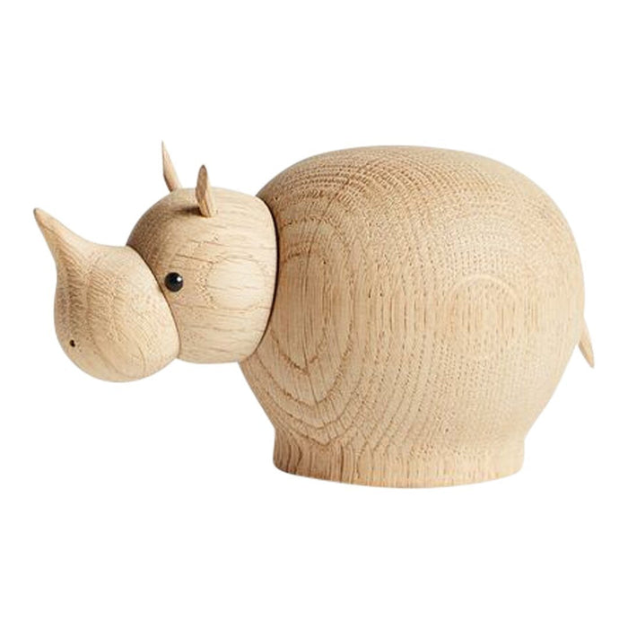 Natural wood rhino figure with a smooth, rounded shape and minimalistic design, showcasing light grain patterns.