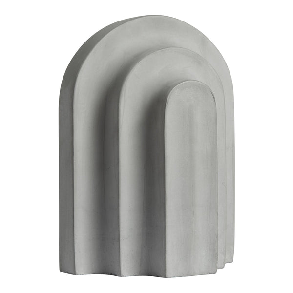 Gray concrete sculpture with smooth, rounded arch patterns in a minimalist design. Ideal for modern decor.