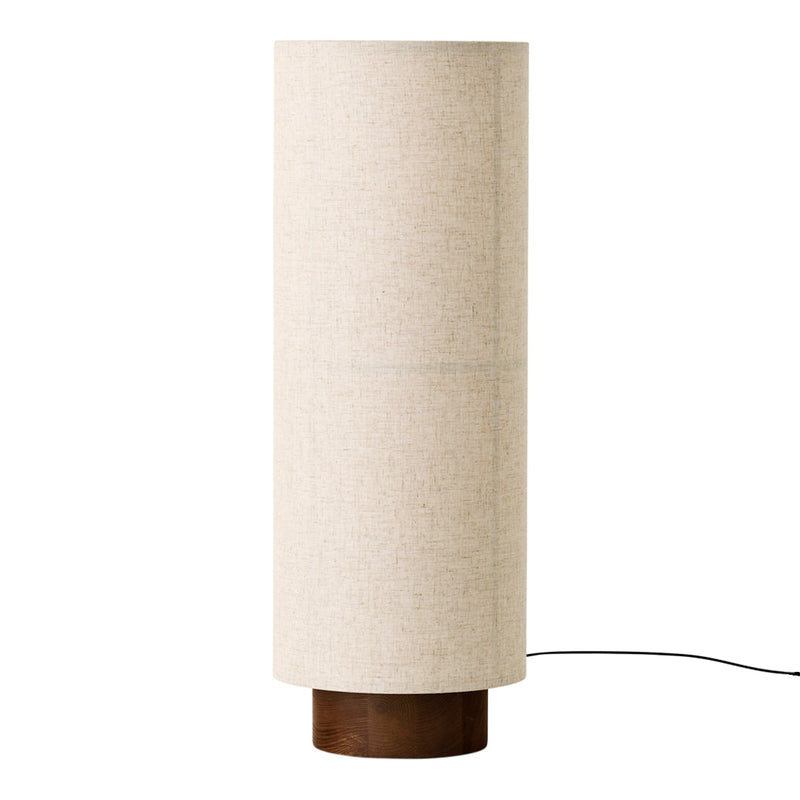 Beige textured lamp with a wooden base, featuring a minimalist cylindrical design. Ideal for modern decor.