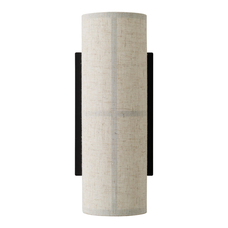 Light beige cylindrical lamp with subtle texture and black accents, featuring a minimalist design.