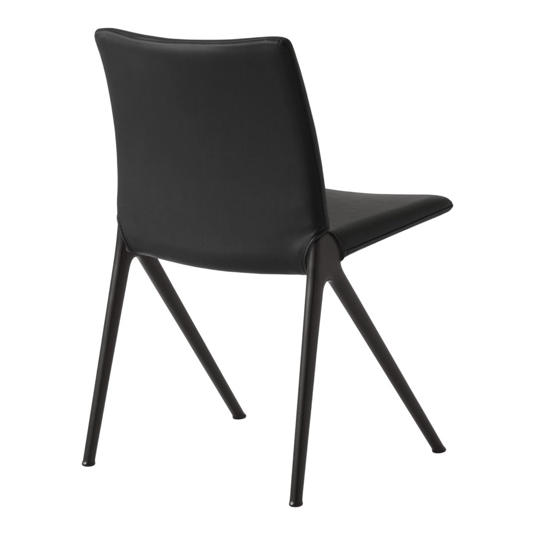 Black upholstered dining chair with sleek, minimalist design and tapered black legs. Perfect for modern interiors.