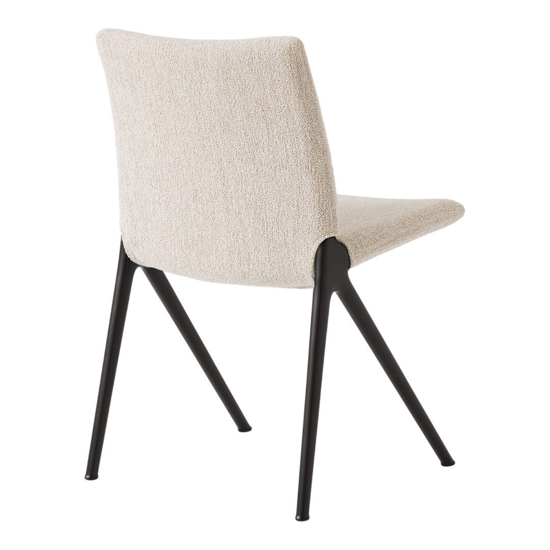 Beige upholstered chair with a textured fabric and sleek black legs, perfect for modern decor.