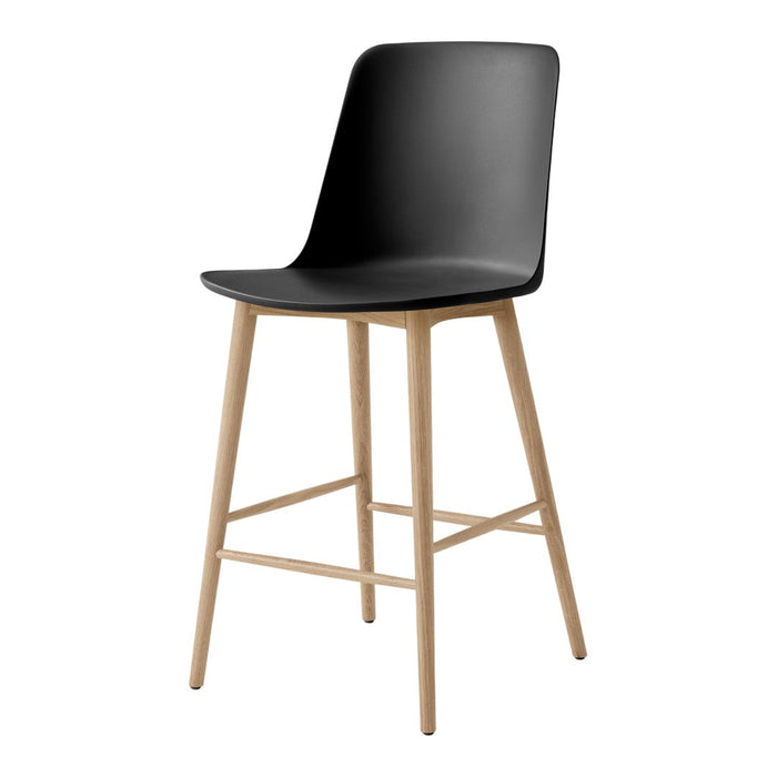 Black ergonomic chair with a smooth finish and natural wood legs, perfect for modern decor.