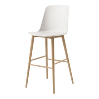 White modern bar stool with a smooth, minimalist design and natural wood legs. Ideal for contemporary decor.