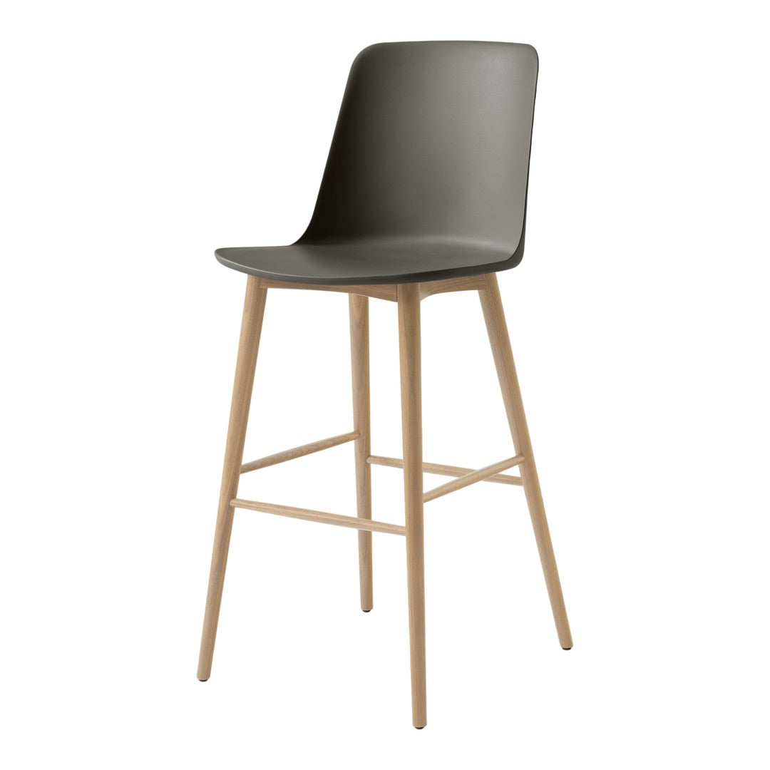 Modern bar stool with a sleek gray plastic seat and light wood legs. Simple design with clean lines and neutral colors.
