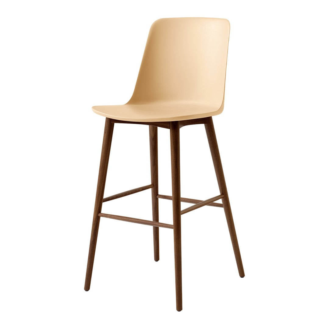 Beige plastic bar stool with a sleek design and warm brown wooden legs. Perfect for modern interiors.
