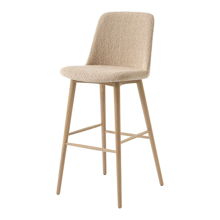 Beige upholstered bar stool with textured fabric and natural wood legs, perfect for modern decor.