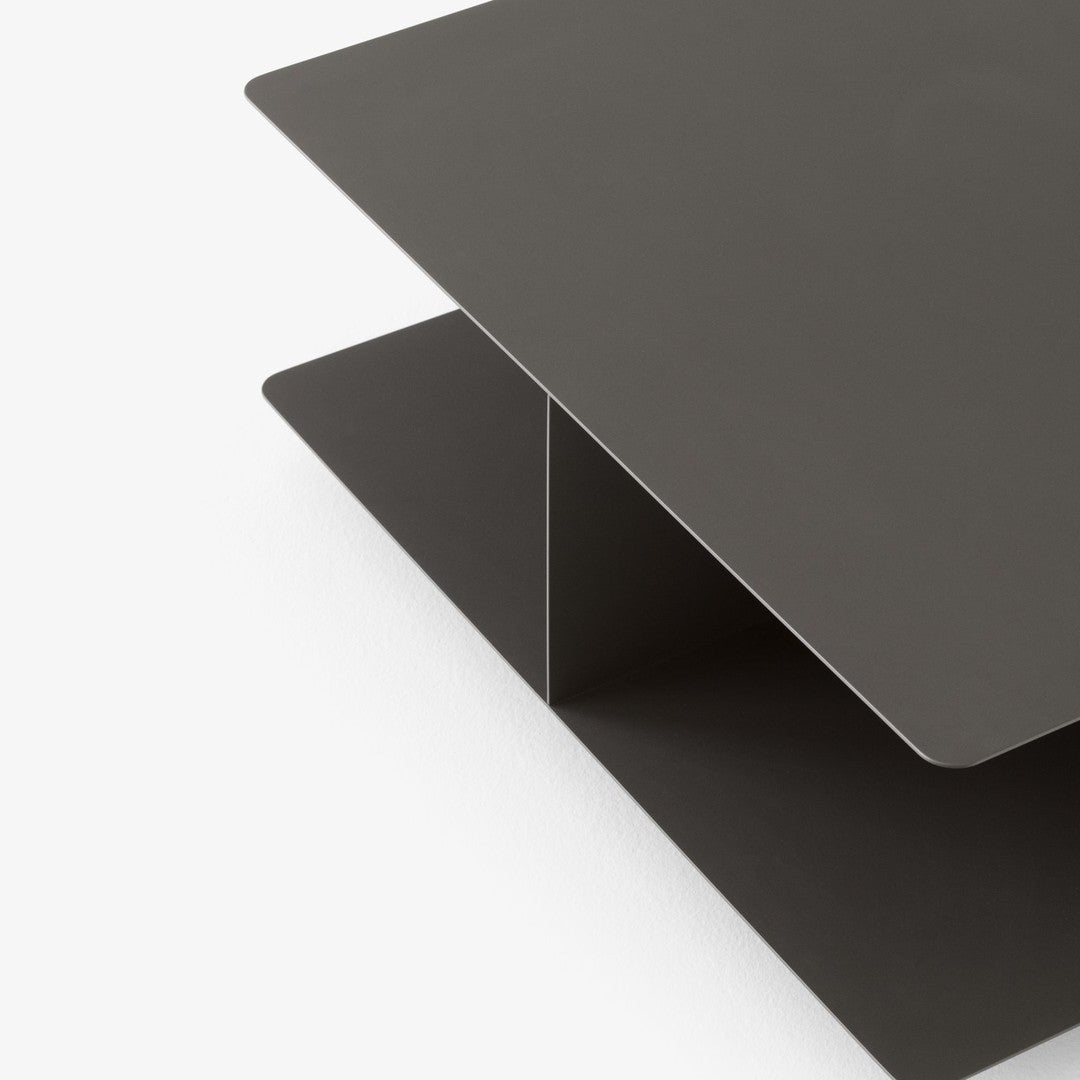 Sleek dark gray metal shelf with a minimalist design and smooth, matte finish. Perfect for modern decor.