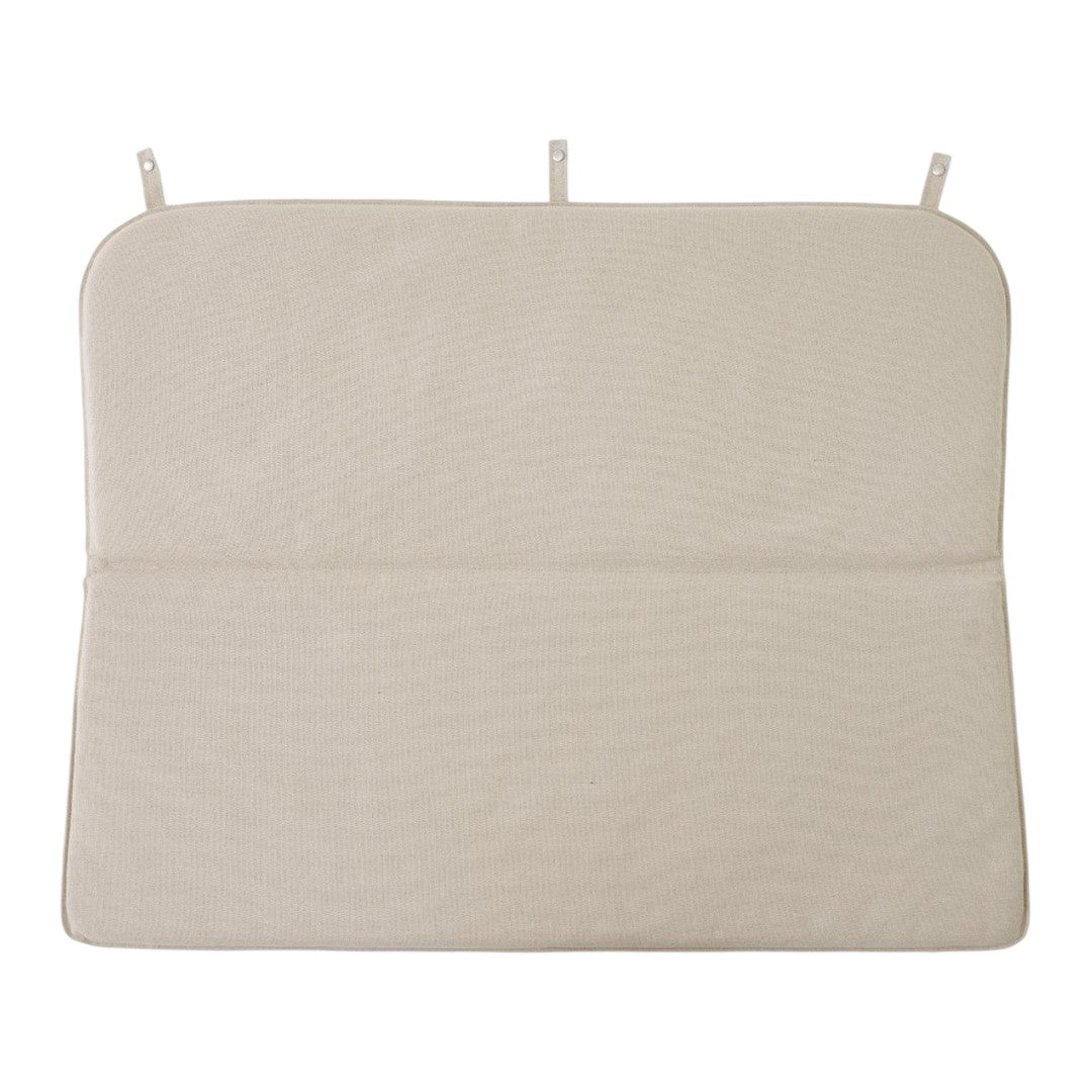 Light beige cushion cover with a smooth texture and no patterns, featuring two hanging ties for easy attachment.