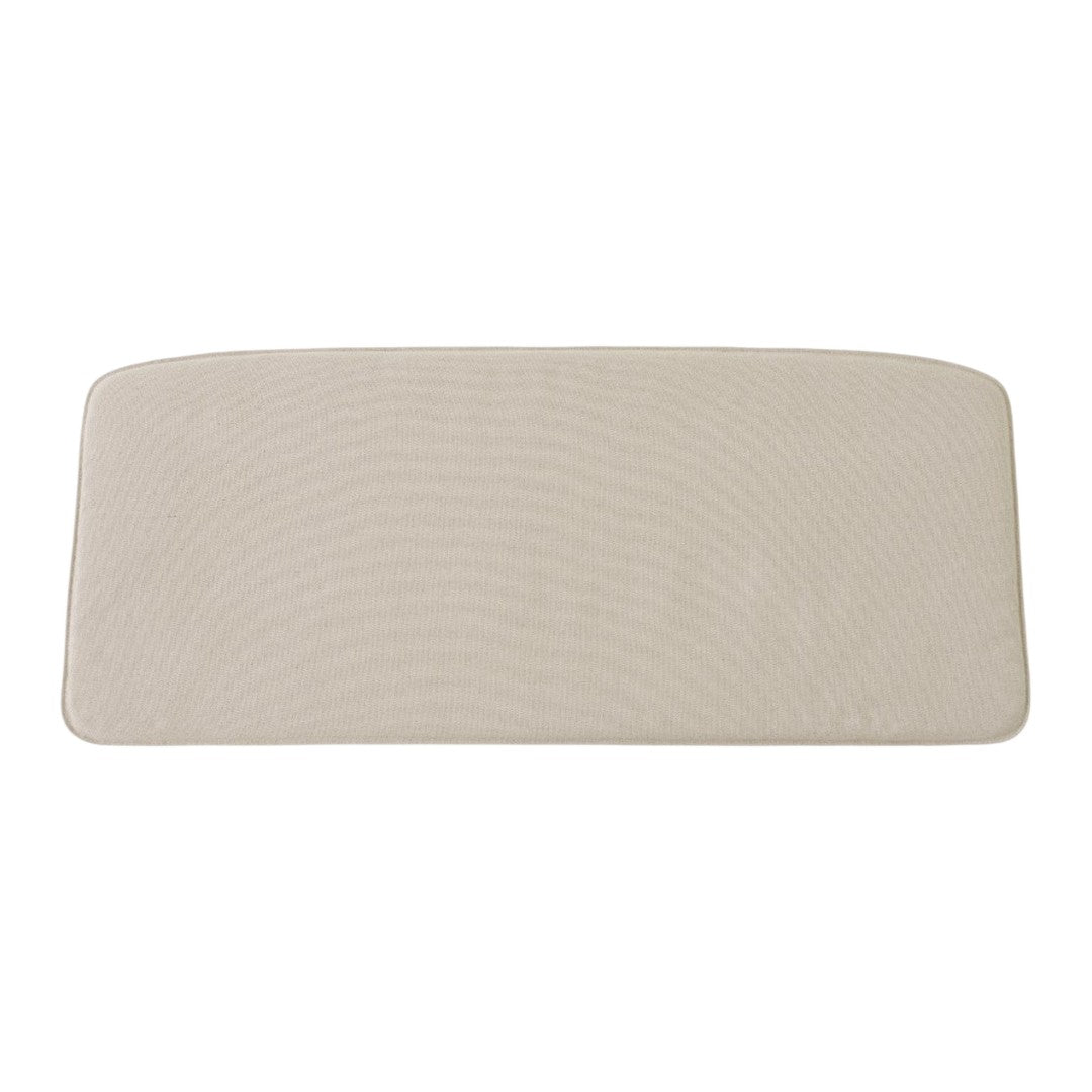 Beige rubber mat with subtle textured pattern, ideal for kitchens or entryways.