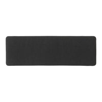 "Solid black kitchen mat with a smooth texture, stylish and minimalistic design for contemporary decor."