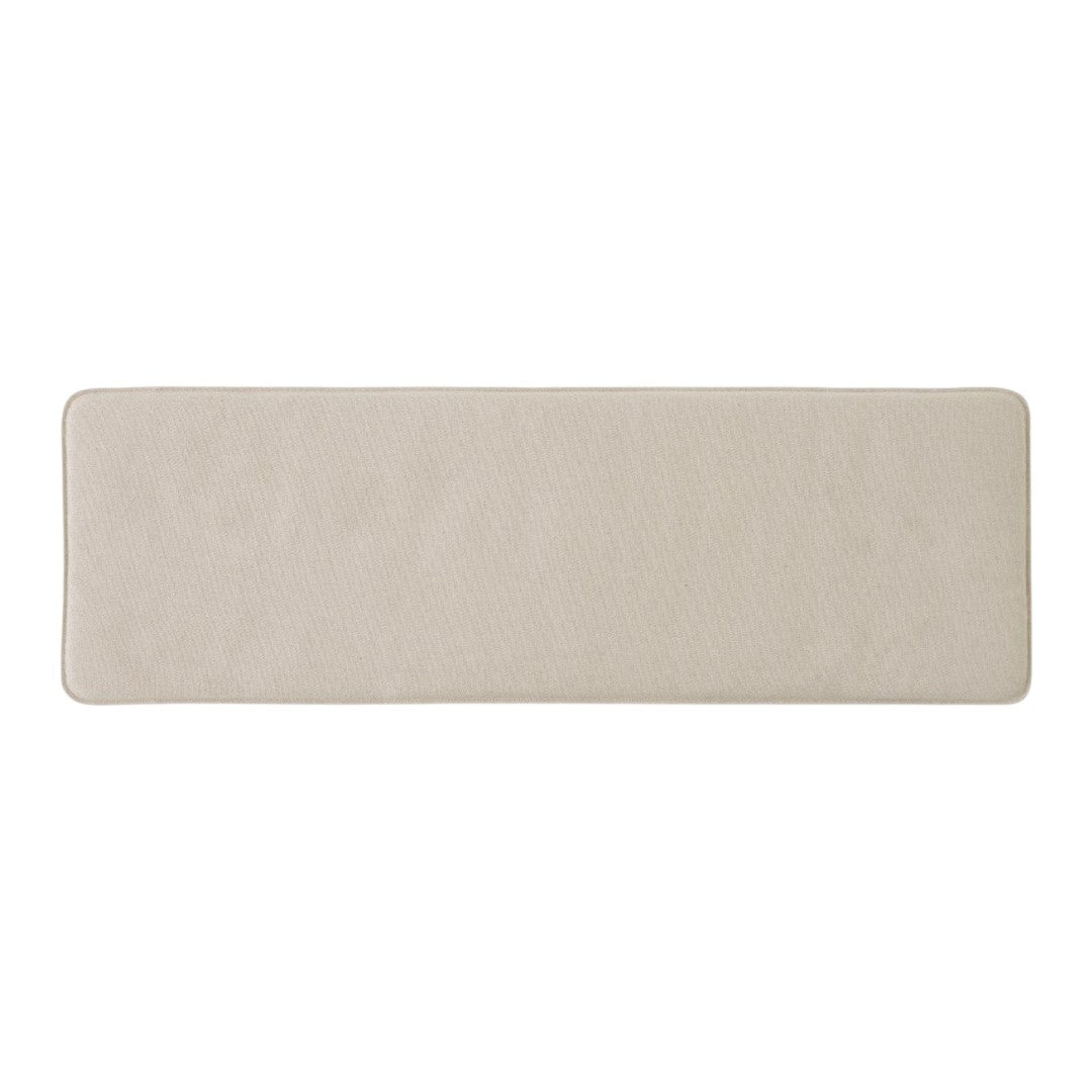 Beige rectangular rug with a smooth texture and no visible patterns, ideal for minimalistic decor.