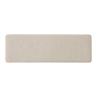 Beige rectangular rug with a smooth texture and no visible patterns, ideal for minimalistic decor.