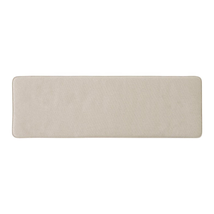 Beige rectangular rug with a smooth texture and no visible patterns, ideal for minimalistic decor.