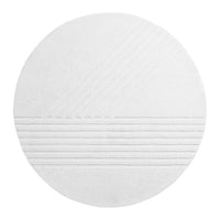 Round white area rug featuring subtle linear patterns in varying textures and depths. Modern minimalist design.