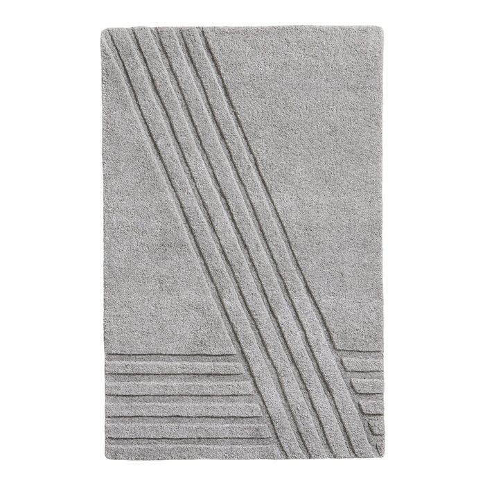 Gray area rug with textured diagonal and horizontal striped patterns. Soft, modern design for contemporary decor.