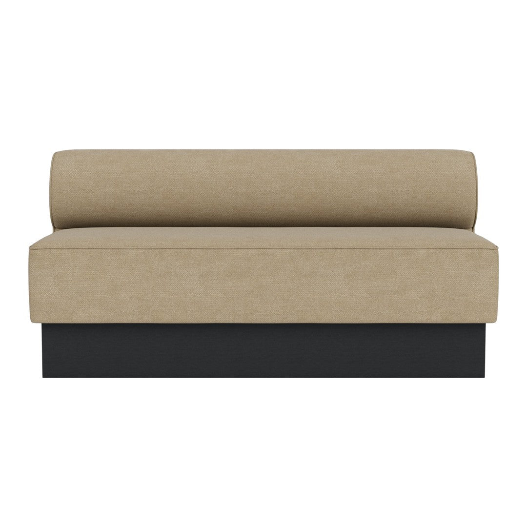 Neutral beige fabric sofa with a rounded back and sleek black base, perfect for modern decor.