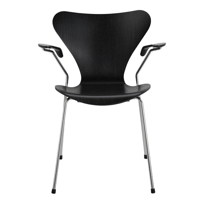 Black modern chair with a sleek, minimalist design and silver legs, perfect for contemporary decor.