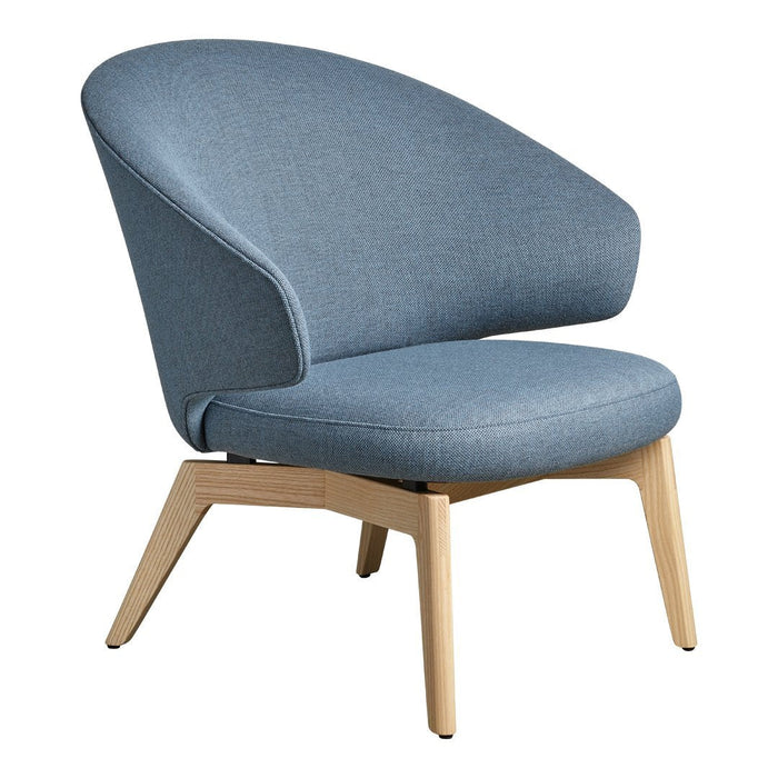 Light blue upholstered chair with a smooth fabric surface and natural wood legs. Modern design with a sleek silhouette.