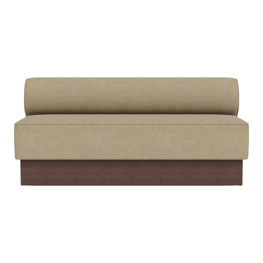 Tan upholstered sofa with a round back cushion and dark wood base, featuring a modern, minimalist design.