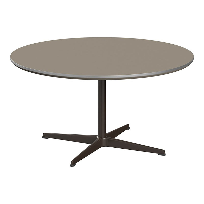 Round table with a smooth, neutral gray top and a sleek black base, perfect for modern decor.