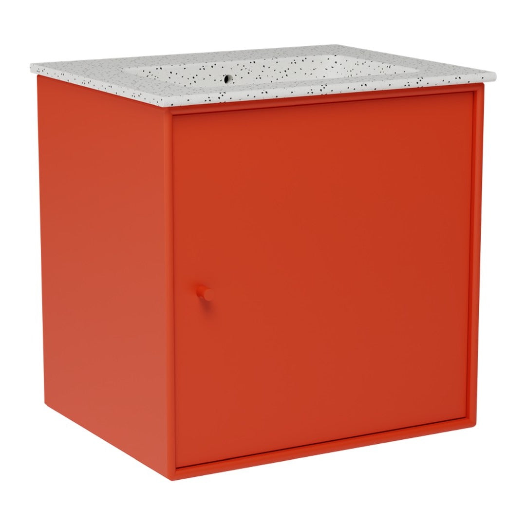 Bright orange cube cabinet with a speckled white top, featuring a sleek design and minimalistic drawer.