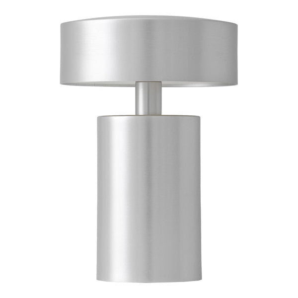 Sleek silver lamp with a modern cylindrical base and round top, featuring a smooth metallic finish.