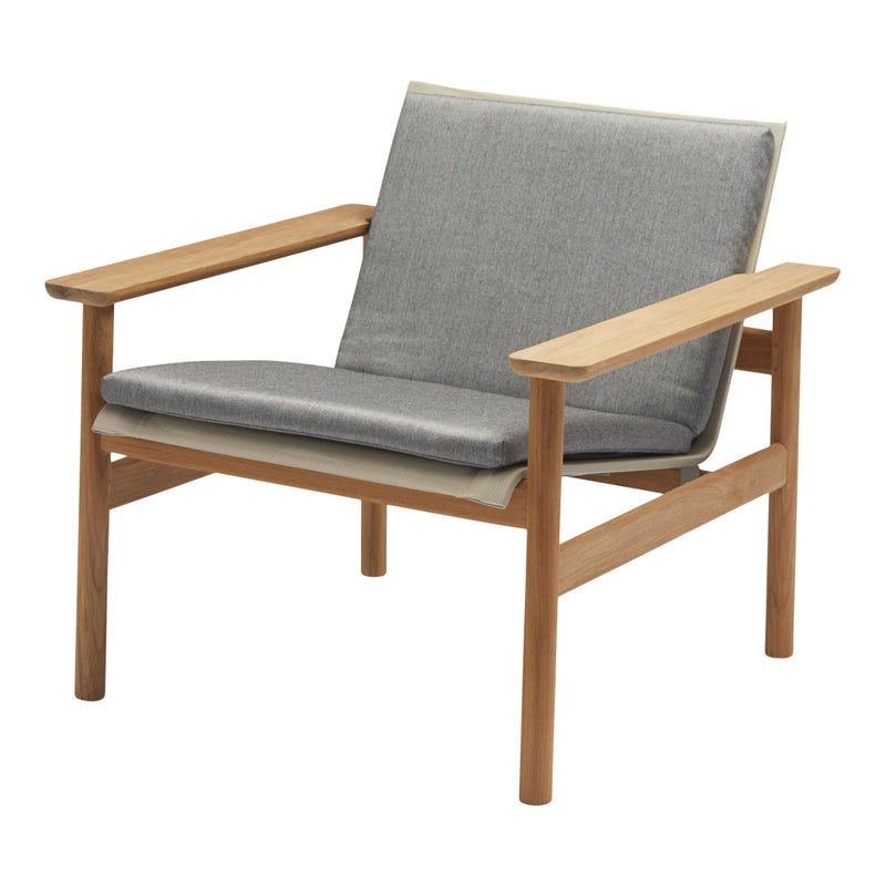 Gray cushioned chair with light wooden frame, featuring a minimalist design. Suitable for modern decor.