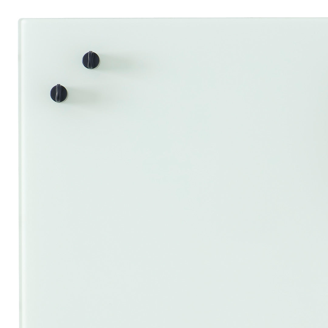 Mint green surface with two black knobs; sleek, minimalist design showcasing subtle color contrast.