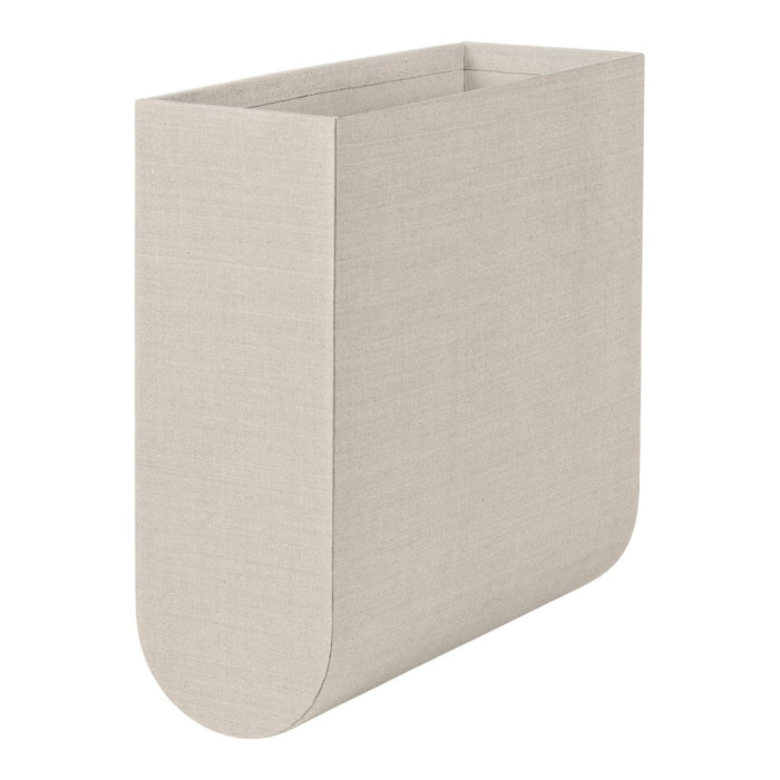 Beige fabric wall organizer with a smooth, minimalist design and rounded edges, perfect for modern decor.