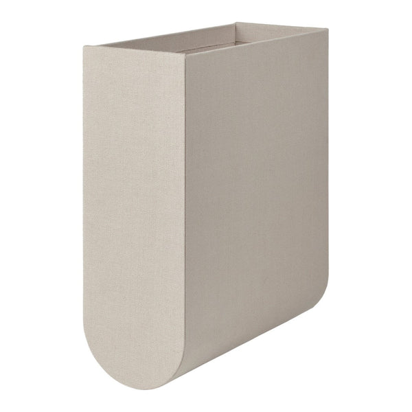 Beige textured fabric storage bin with a smooth curved base and minimalist design.