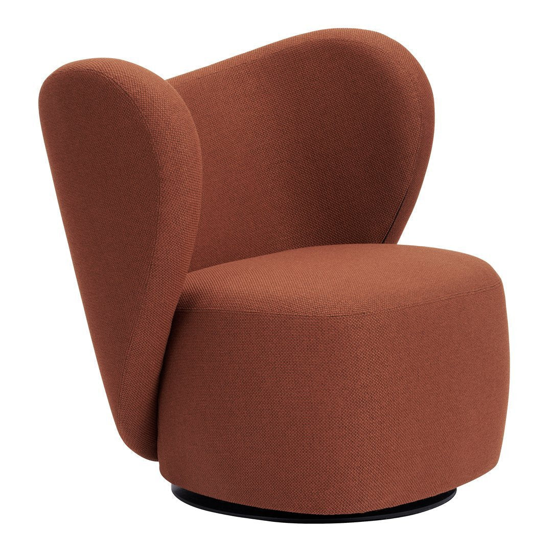 Round, terracotta upholstered chair with curved arms, featuring a smooth, minimalist design.
