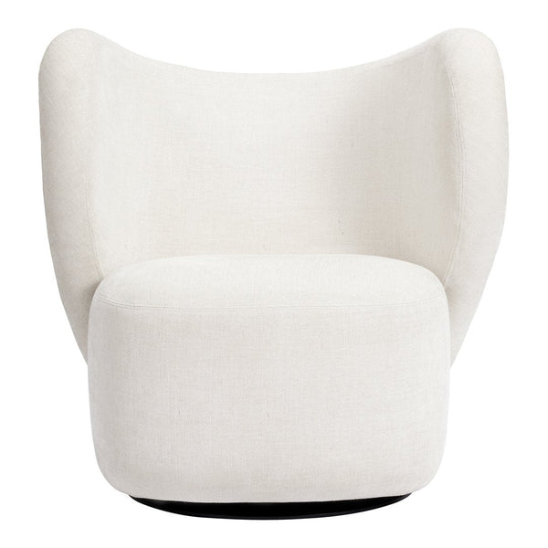 Cozy white accent chair with smooth fabric and a contemporary curved design, perfect for modern decor.