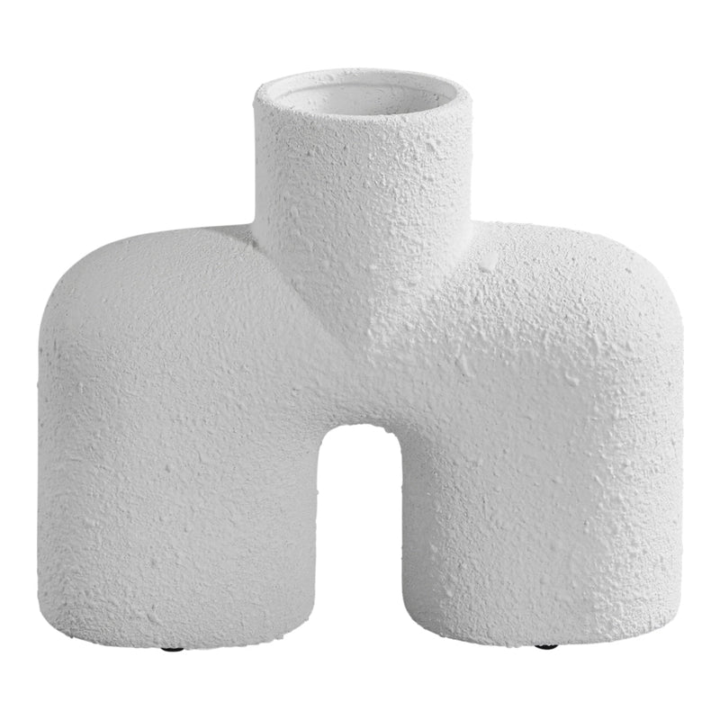 Textured white ceramic vase with a modern geometric design, featuring a matte finish and unique sculptural shape.