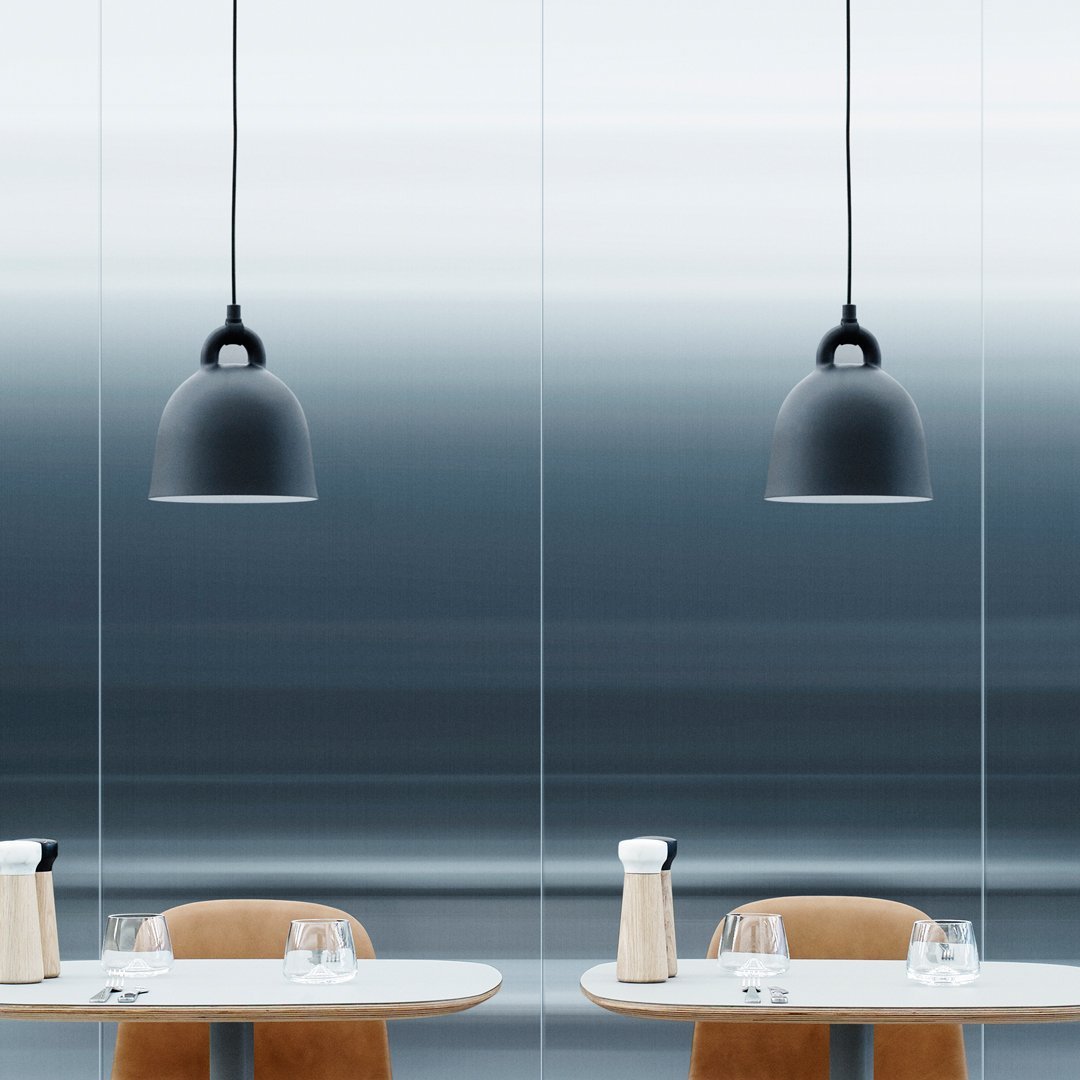 "Modern black pendant lamp with sleek design, set against a gradient blue and gray background."