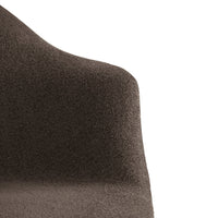 Textured brown chair with a smooth finish, showcasing deep earthy tones and subtle patterns. Perfect for modern decor.